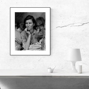 Dorothea Lange's Migrant Mother Framed Hanging Above A Table