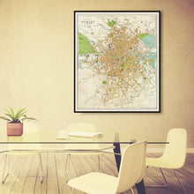 Load image into Gallery viewer, Bacon&#39;s Plan of Dublin Ireland &amp; Suburbs Map Print Framed Hanging In A Conference Room
