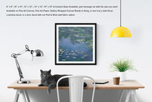 Load image into Gallery viewer, Claude Monet Water Lilies at Giverny Art Print Hanging Above A Table
