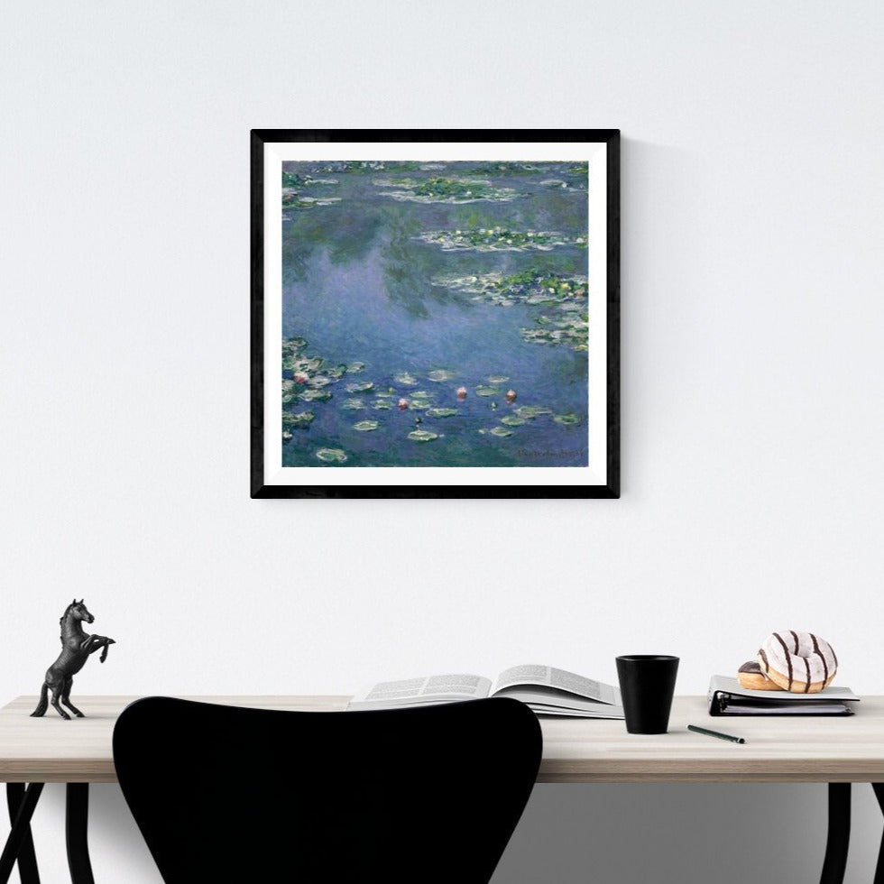 Claude Monet Water Lilies at Giverny Art Print Hanging Above A Desk